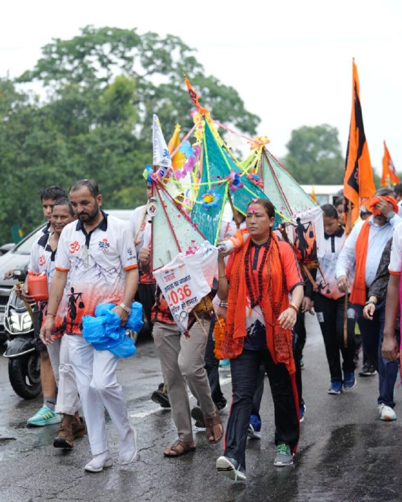 Olympic2036KanwarYatra : हरिद्वार से शुरू होकर रायवाला पहुंची यात्रा का जगह-जगह श्रद्धालुओं ने किया भव्य स्वागत Olympic2036KanwarYatra